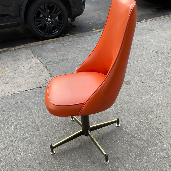 Pair of Orange Mid Century Swivel Chairs