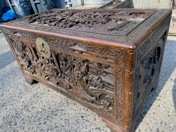 Tall hand carved antique chest