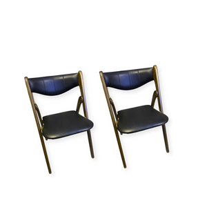Pairs of Stack-a-More Black Vinyl and Wood Folding Dining Chairs