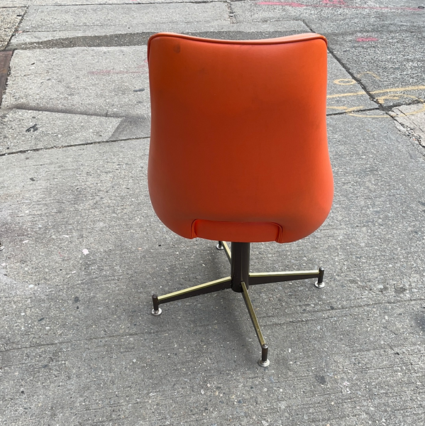 Pair of Orange Mid Century Swivel Chairs